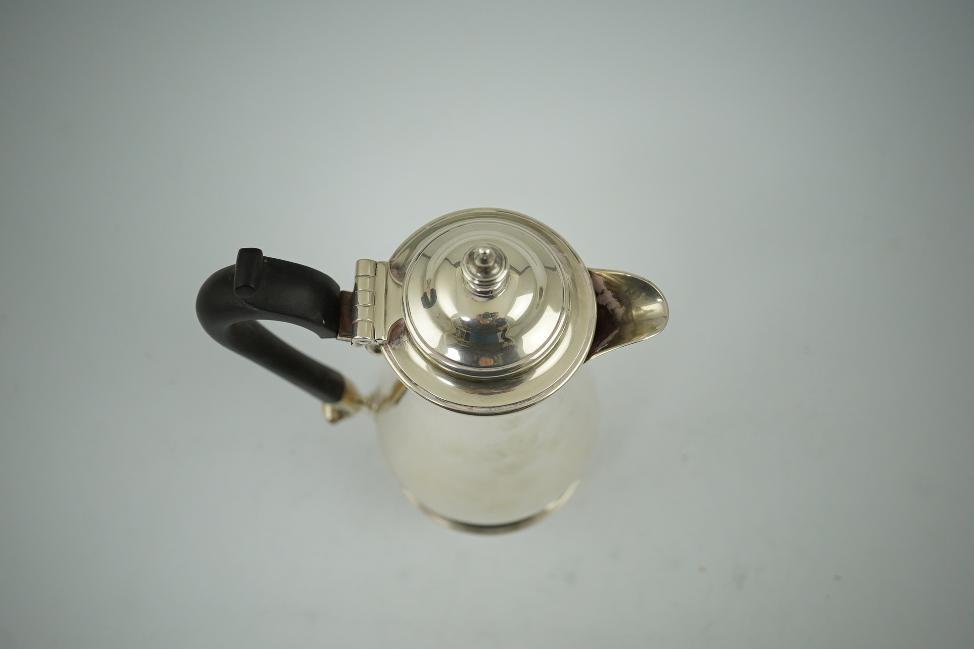 A George VI silver hot water pot, by George Howson